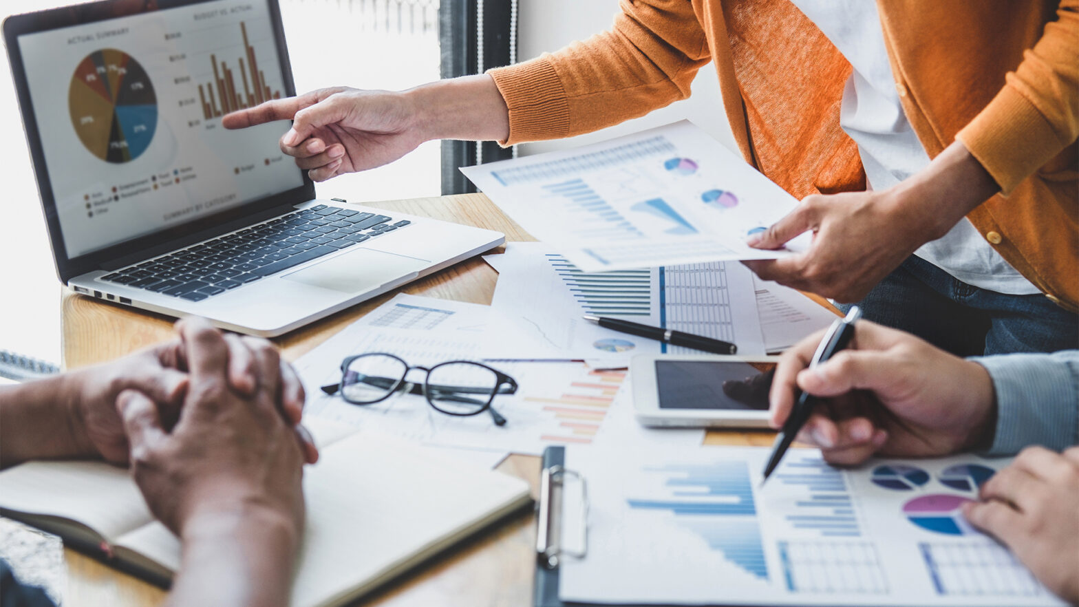 Business team meeting to conference, collaboration discussing working analyzing with financial data and marketing business strategy project,